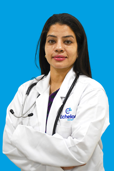 Female doctor in white coat with a stethoscope, arms crossed, against a bright blue background.
