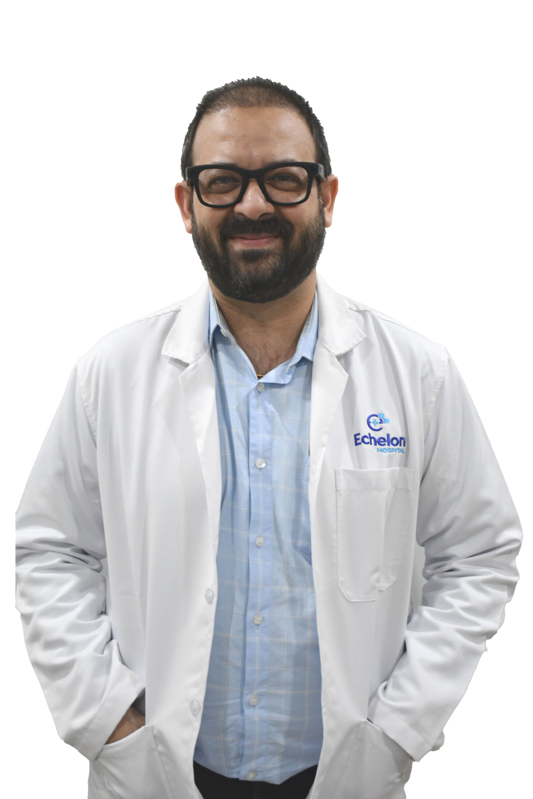 Smiling male doctor with glasses in a white lab coat, standing against a white background.