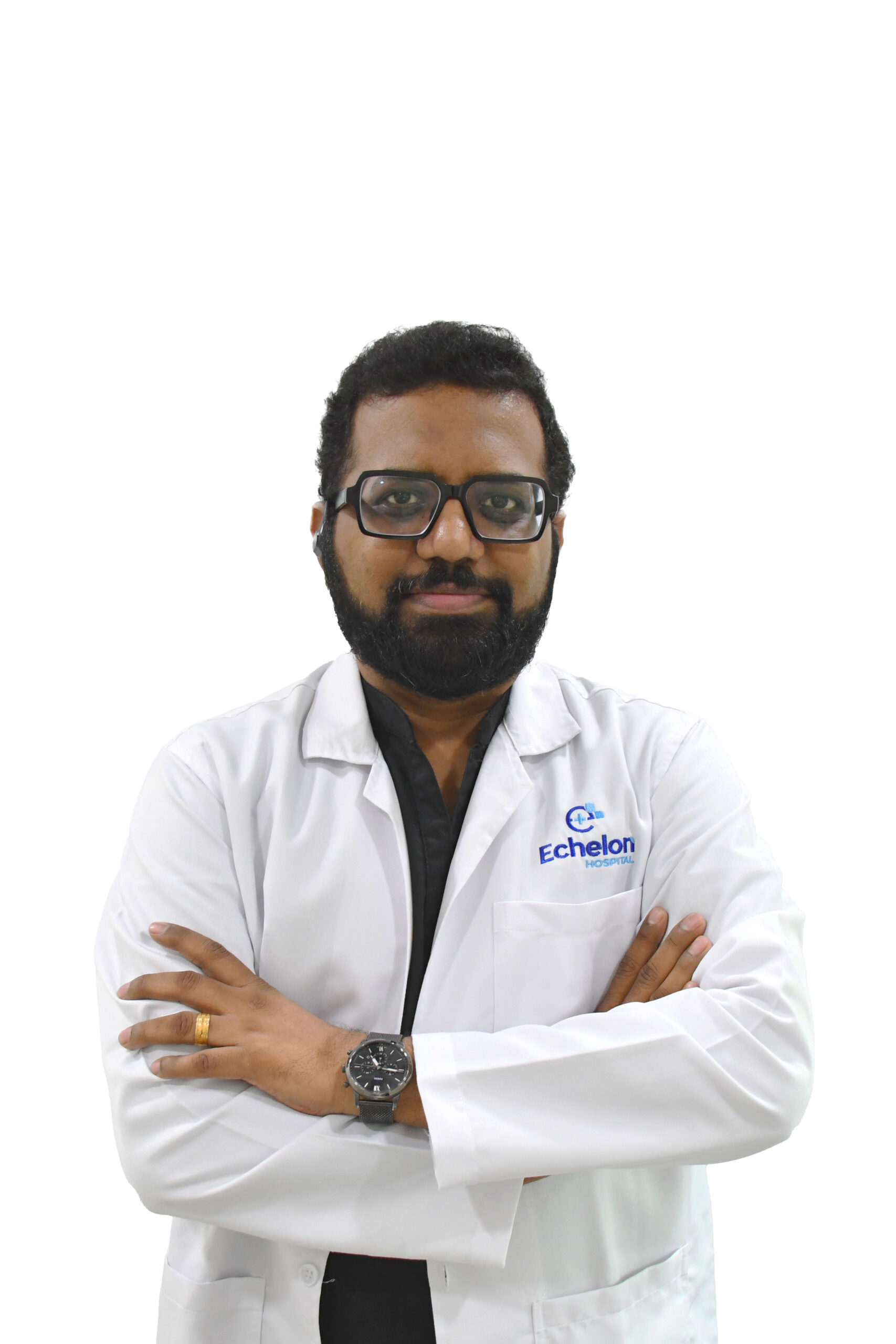 Male healthcare professional with glasses and a beard, wearing a white lab coat with Echelon Hospital logo, arms crossed.