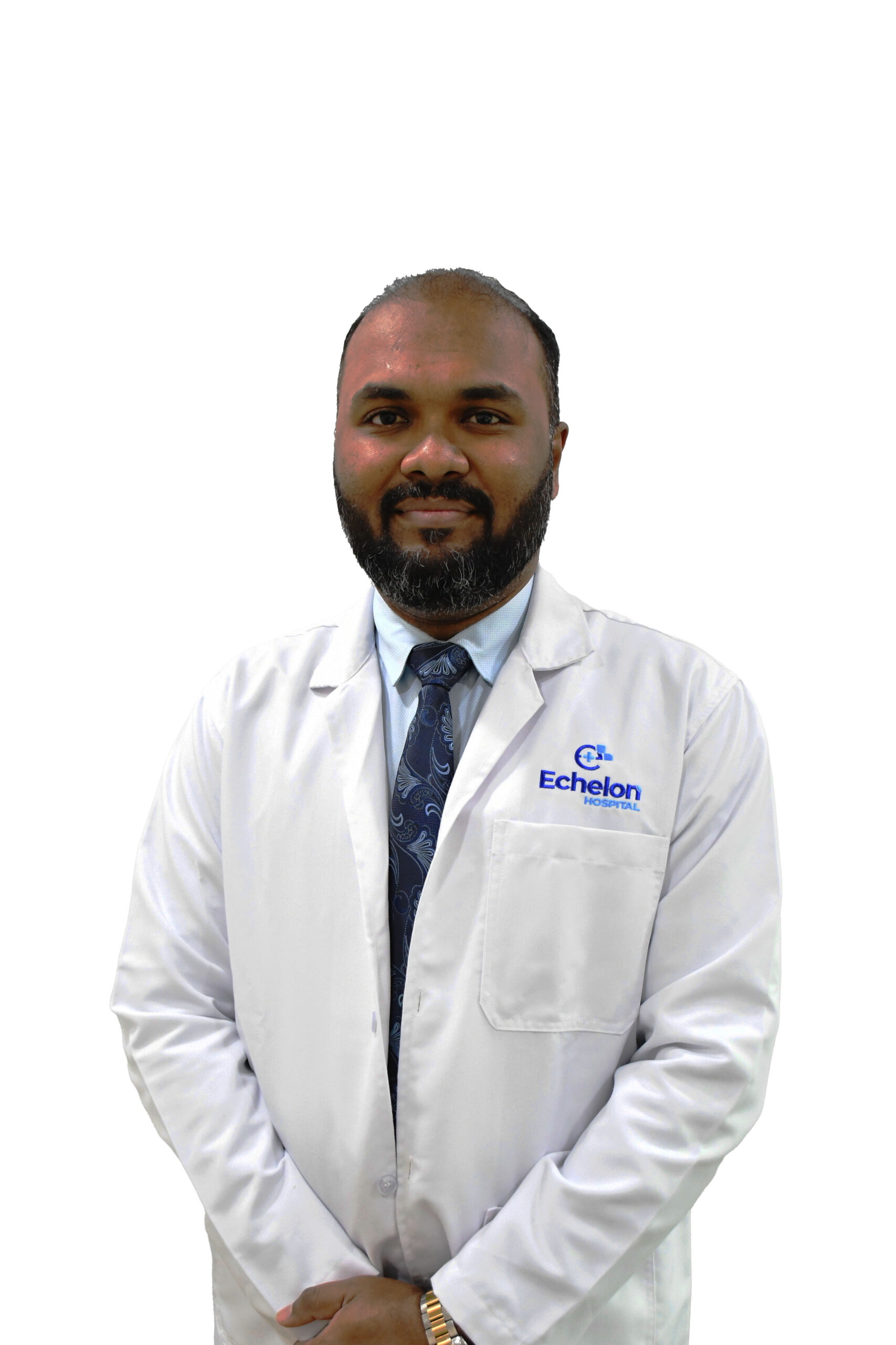 Portrait of a doctor wearing a white coat with the Echelon Hospital logo and a blue patterned tie.