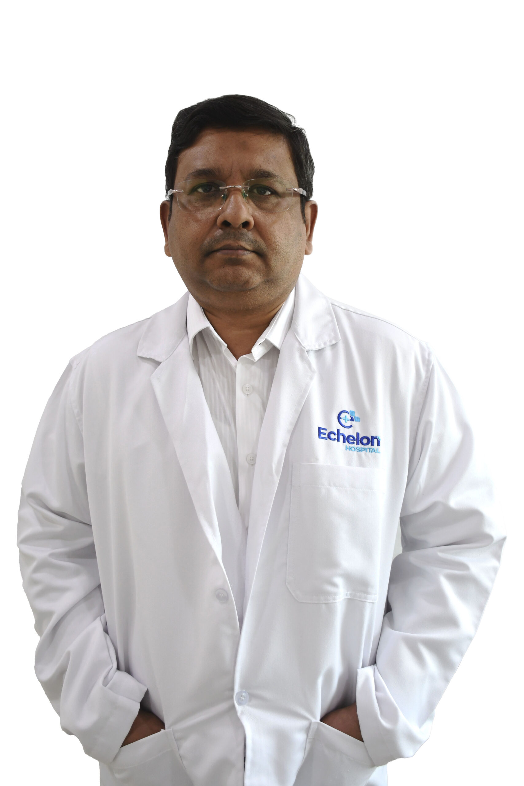 Middle-aged male doctor in a white lab coat with arms crossed, standing against a white background.