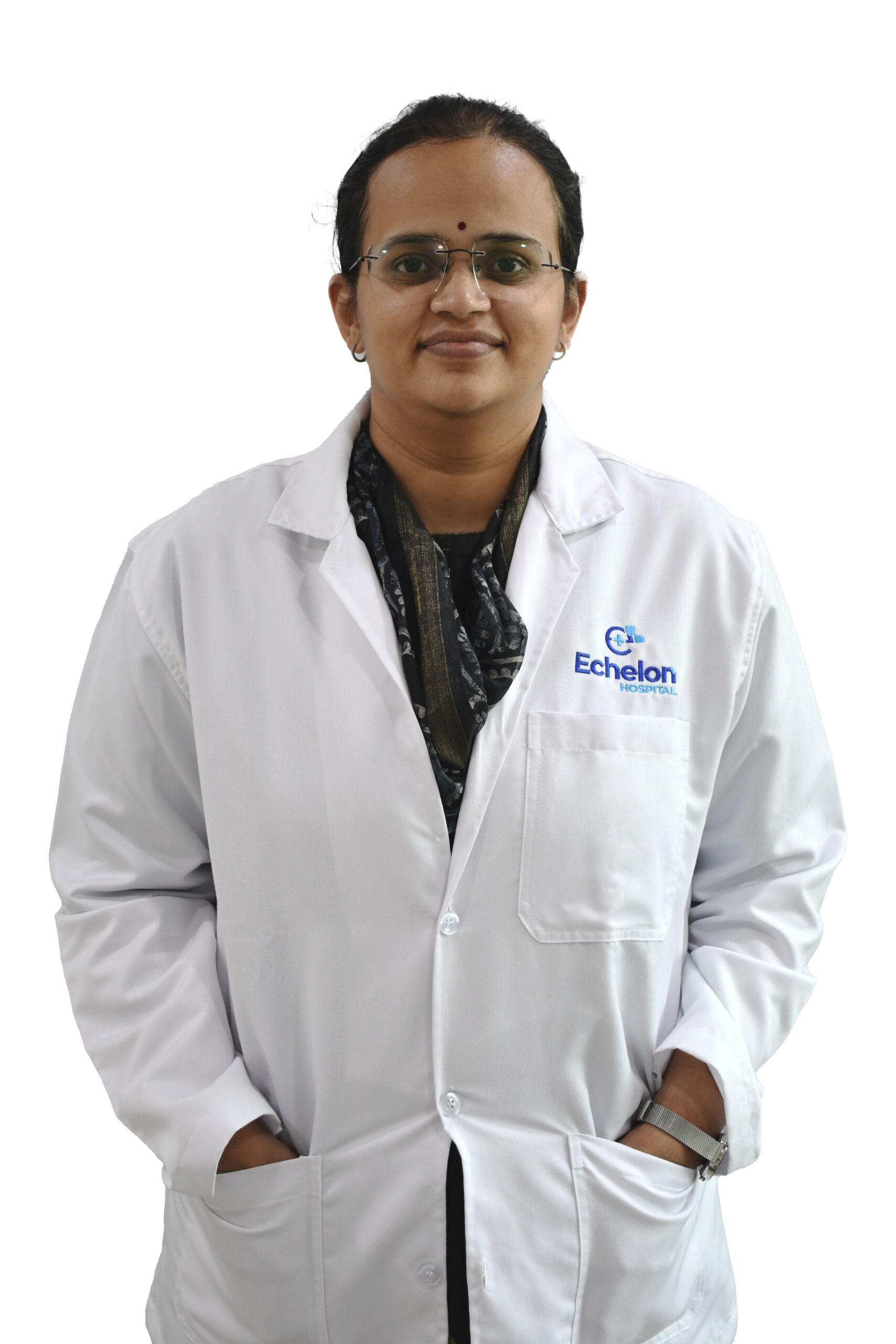 Female medical professional in a white lab coat with an Echelon Hospital logo, standing with hands in pockets