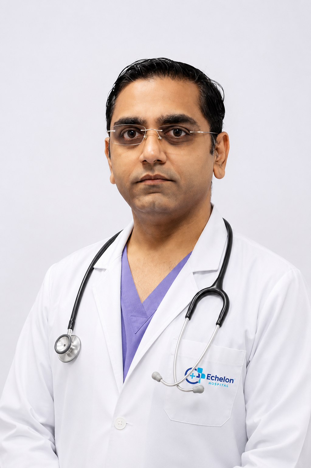 Male doctor in a white coat with stethoscope around his neck, looking at the camera (Echelon Hospital logo on pocket).